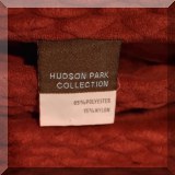 D071. Hudson Park Collection red throw blanket.